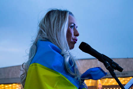 Tel Aviv, Israel - March 20, 2022 Protesters against Russian policy towards Ukraine in Habima Square...