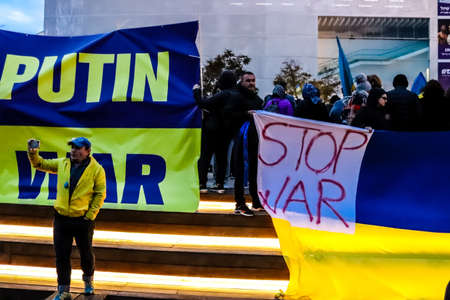 Tel Aviv, Israel - March 20, 2022 Protesters against Russian policy towards Ukraine in Habima Square...