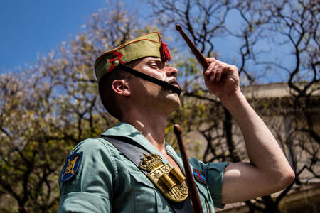 Seville, Spain - May 01, 2022 Parade of professional soldiers from the Spanish Legion, this military...