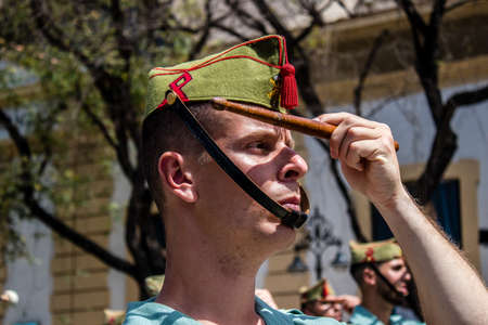 Seville, Spain - May 01, 2022 Parade of professional soldiers from the Spanish Legion, this military...