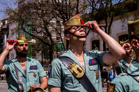 Seville, Spain - May 01, 2022 Parade of professional soldiers from the Spanish Legion, this military unit of the Spanish Army parade through the streets of Seville for the launch of the Feriaのeditorial素材