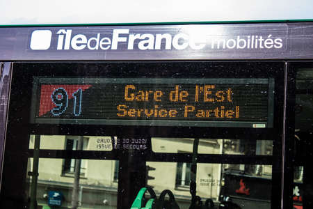 Paris, France - May 21, 2022 Bus driving through the streets of Paris during the coronavirus outbreak hitting France, wearing a mask is mandatoryのeditorial素材