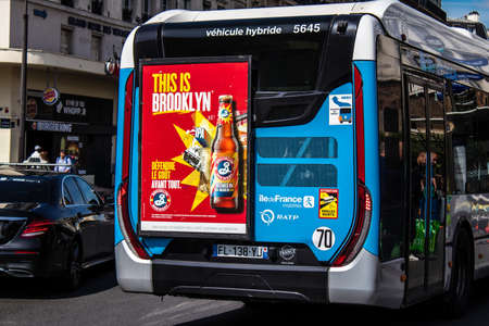 Paris, France - May 21, 2022 Bus driving through the streets of Paris during the coronavirus...