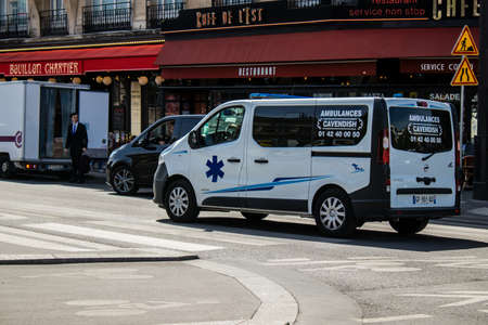 Paris, France - May 21, 2022 Ambulance driving through the streets of Paris during the coronavirus outbreak hitting Franceのeditorial素材