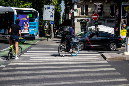 Paris, France - May 21, 2022 People rolling with a bicycle in the streets of Paris during the coronavirus outbreak hitting Franceのeditorial素材