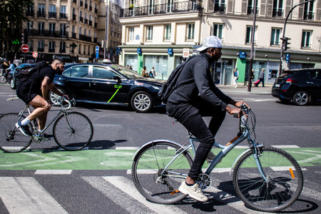 Paris, France - May 21, 2022 People rolling with a bicycle in the streets of Paris during the coronavirus outbreak hitting Franceのeditorial素材