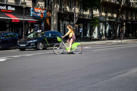 Paris, France - May 21, 2022 People rolling with a bicycle in the streets of Paris during the coronavirus outbreak hitting Franceのeditorial素材