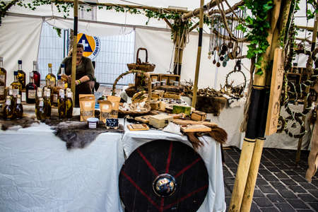 Reims, France - May 28, 2022 Artisan stall selling their wares at the medieval market during the Johanniques festivities, back after a two year hiatus following coronavirus outbreakのeditorial素材