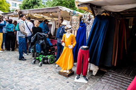 Reims, France - May 28, 2022 Artisan stall selling their wares at the medieval market during the Johanniques festivities, back after a two year hiatus following coronavirus outbreakのeditorial素材