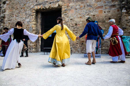 Reims, France - May 28, 2022 Musician of a Middle Ages music group performing at the Johanniques festivities, this event is back after a two-year hiatus following the outbreak of coronavirusのeditorial素材