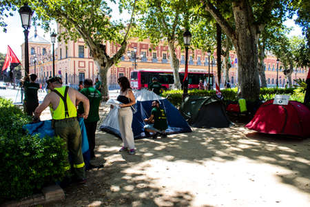 Seville, Spain - June 01, 2022 Demonstrations by firefighters in the streets of Seville, they demand recognition of the difficulty of their profession as well as an increase in wagesのeditorial素材