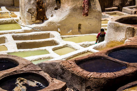 Fez, Morocco - June 13, 2022 Chouara Tannery, The dyeing vats at Chouara are among the Fez medina's most iconic sights. The ancient craft of tanning and dyeing, in all its visceral authenticityのeditorial素材