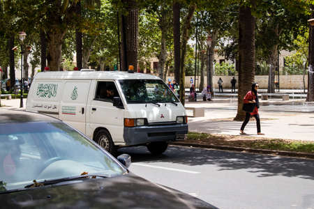 Fez, Morocco - June 14, 2022 Ambulance driving through the streets of Fez during the coronavirus outbreak hitting Moroccoのeditorial素材