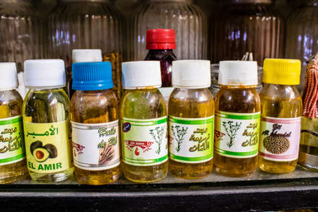 Fez, Morocco - June 15, 2022 Oriental products, essential oils, creams and spices sold in the souk of Fez located in the medina where traditional Arab markets that offer all kinds of productsのeditorial素材