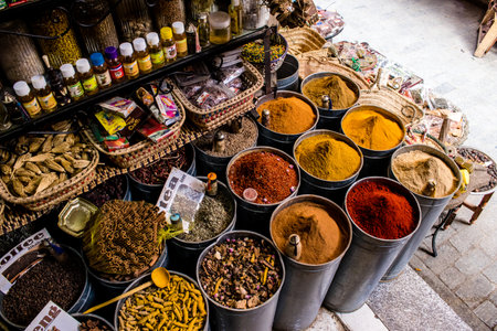 Fez, Morocco - June 15, 2022 Oriental products, essential oils, creams and spices sold in the souk of Fez located in the medina where traditional Arab markets that offer all kinds of productsのeditorial素材