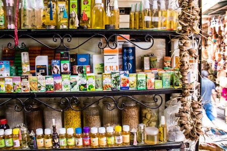 Fez, Morocco - June 15, 2022 Oriental products, essential oils, creams and spices sold in the souk of Fez located in the medina where traditional Arab markets that offer all kinds of productsのeditorial素材