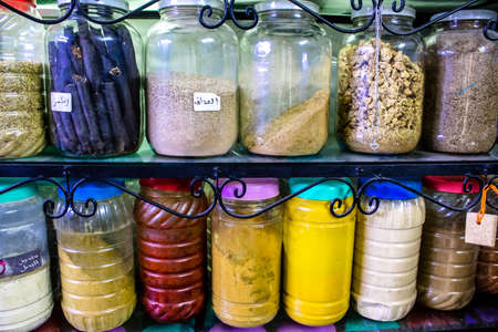 Fez, Morocco - June 15, 2022 Oriental products, essential oils, creams and spices sold in the souk of Fez located in the medina where traditional Arab markets that offer all kinds of productsのeditorial素材