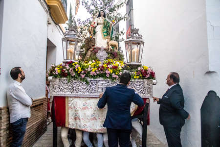 Carmona, Spain - June 18, 2022 Corpus Christi of Carmona, Religious procession in the streets,...