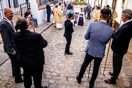 Carmona, Spain - June 18, 2022 Corpus Christi of Carmona, Religious procession in the streets,...