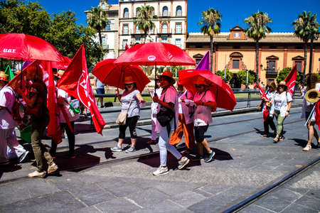 Seville Spain June 25, 2022 Employees and domestic staff working in personal assistance taking part in a demonstration in the city center of Seville during the coronavirus outbreak hitting Spainのeditorial素材