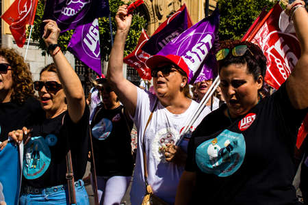 Seville Spain June 25, 2022 Employees and domestic staff working in personal assistance taking part in a demonstration in the city center of Seville during the coronavirus outbreak hitting Spainのeditorial素材