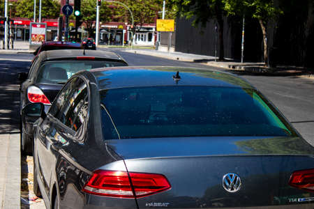 Seville, Spain - July 04, 2022 Cars parked in the streets of Seville, an emblematic city and the capital of the region of Andalusia, in the south of Spainのeditorial素材