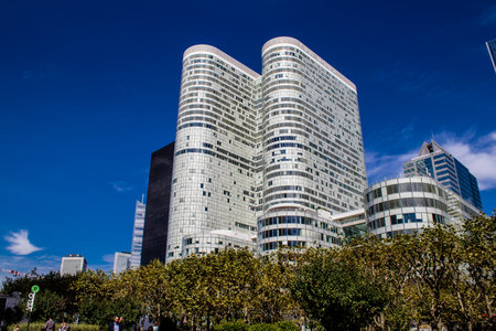 Paris, France - September 12, 2022 Cityscape and architecture of La Defense, a business district located in Greater Paris, skyscrapers surround the famous arch in the center of the esplanadeのeditorial素材