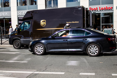 Paris, France - September 14, 2022 Taxi driving through the streets of Paris, This mode of transport...