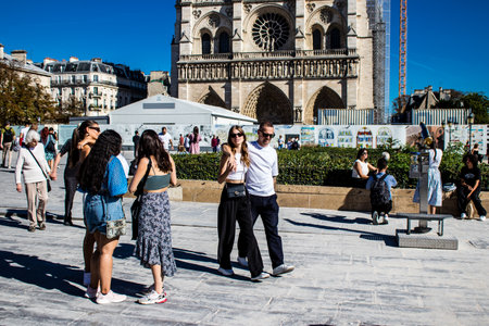 Paris, France - September 14, 2022 Tourists strolling in the streets of Paris, an emblematic city and the capital of Franceのeditorial素材