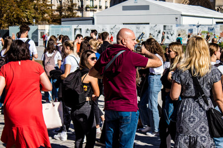 Paris, France - September 14, 2022 Tourists strolling in the streets of Paris, an emblematic city and the capital of Franceのeditorial素材