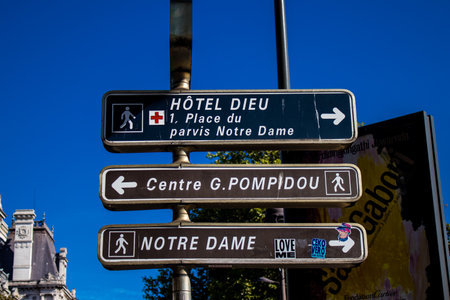 Paris, France - September 14, 2022 Street sign or road sign, erected at the side of or above roads to provide information to road user in the downtown area of Parisのeditorial素材