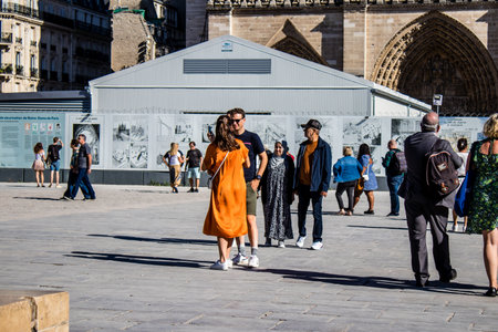 Paris, France - September 14, 2022 Tourists strolling in the streets of Paris, an emblematic city and the capital of Franceのeditorial素材
