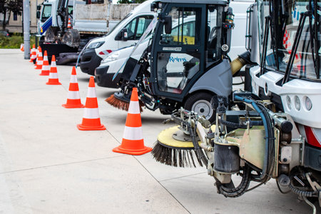 Reims, France - September 17, 2022 Street cleaning cars and garbage truck parked in the streets of Reims taking part in the world day to clean up our planet, garbage collection helps prevent pollutionのeditorial素材