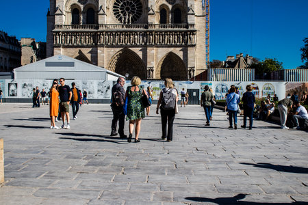 Paris, France - September 14, 2022 Tourists strolling in the streets of Paris, an emblematic city and the capital of Franceのeditorial素材