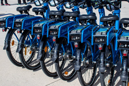 Reims, France - September 17, 2022 Accessible bicycles to hire for short periods of time, usually for a few hours parked in the street and part of the public transport system of Reimsのeditorial素材