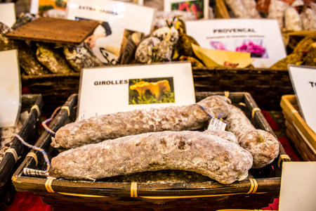 Reims, France - September 17, 2022 Various dry sausages sold in the market of Reims, the sausages are made in an artisanal way with different animal meats, delicatessen is part of the french cuisineのeditorial素材