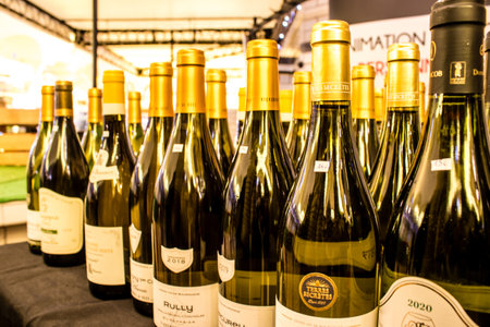 Reims, France - September 17, 2022 Wine bottles sold in the market of Reims. Red and white wines are part of French culture, recognized worldwide for the exceptional production of its various winesのeditorial素材