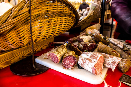 Reims, France - September 17, 2022 Various dry sausages sold in the market of Reims, the sausages are made in an artisanal way with different animal meats, delicatessen is part of the french cuisineのeditorial素材