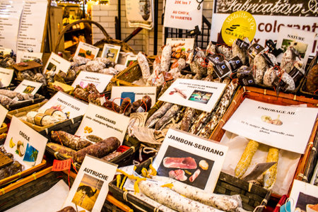 Reims, France - September 17, 2022 Various dry sausages sold in the market of Reims, the sausages are made in an artisanal way with different animal meats, delicatessen is part of the french cuisineのeditorial素材