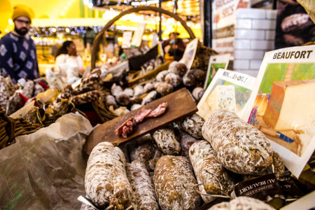 Reims, France - September 17, 2022 Various dry sausages sold in the market of Reims, the sausages are made in an artisanal way with different animal meats, delicatessen is part of the french cuisineのeditorial素材