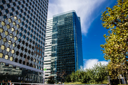 Paris, France - September 12, 2022 Cityscape and architecture of La Defense, a business district located in Greater Paris, skyscrapers surround the famous arch in the center of the esplanadeのeditorial素材