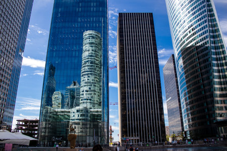 Paris, France - September 12, 2022 Cityscape and architecture of La Defense, a business district located in Greater Paris, skyscrapers surround the famous arch in the center of the esplanadeのeditorial素材