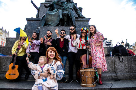Krakow, Poland - October 08, 2022 Demonstration of Ukrainian people at Rynek GÅowny Square against the invasion of Russia, Poland hosts a large number of refugees due to the proximity of the countryのeditorial素材