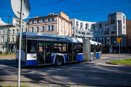 Krakow, Poland - October 08, 2022 Bus driving in the streets of Krakow and part of the transport system of the city, the fares are not expensiveのeditorial素材
