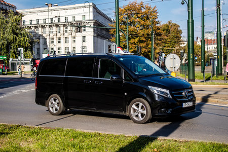 Krakow, Poland - October 08, 2022 Taxi driving in the streets of Krakow and part of the transport system of the city, several taxi companies compete for this activity and the fares are not expensiveのeditorial素材