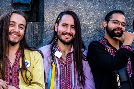 Krakow, Poland - October 08, 2022 Demonstration of Ukrainian people at Rynek GÅowny Square against the invasion of Russia, Poland hosts a large number of refugees due to the proximity of the countryのeditorial素材