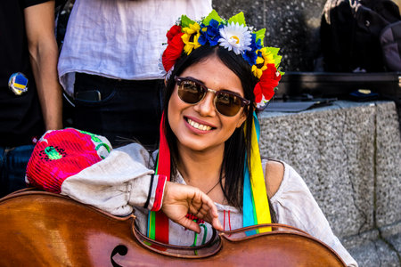 Krakow, Poland - October 08, 2022 Demonstration of Ukrainian people at Rynek GÅowny Square against the invasion of Russia, Poland hosts a large number of refugees due to the proximity of the countryのeditorial素材