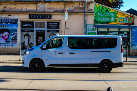 Krakow, Poland - October 08, 2022 Taxi driving in the streets of Krakow and part of the transport system of the city, several taxi companies compete for this activity and the fares are not expensiveのeditorial素材