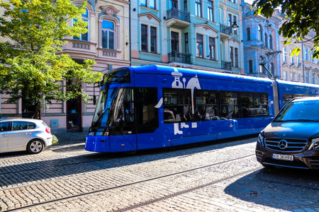 Krakow, Poland - October 08, 2022 Modern electric tram driving in the streets of Krakow and part of the transport system of the city, the fares are not expensiveのeditorial素材