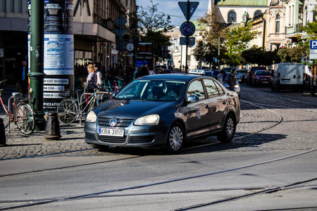 Krakow, Poland - October 08, 2022 Taxi driving in the streets of Krakow and part of the transport system of the city, several taxi companies compete for this activity and the fares are not expensiveのeditorial素材